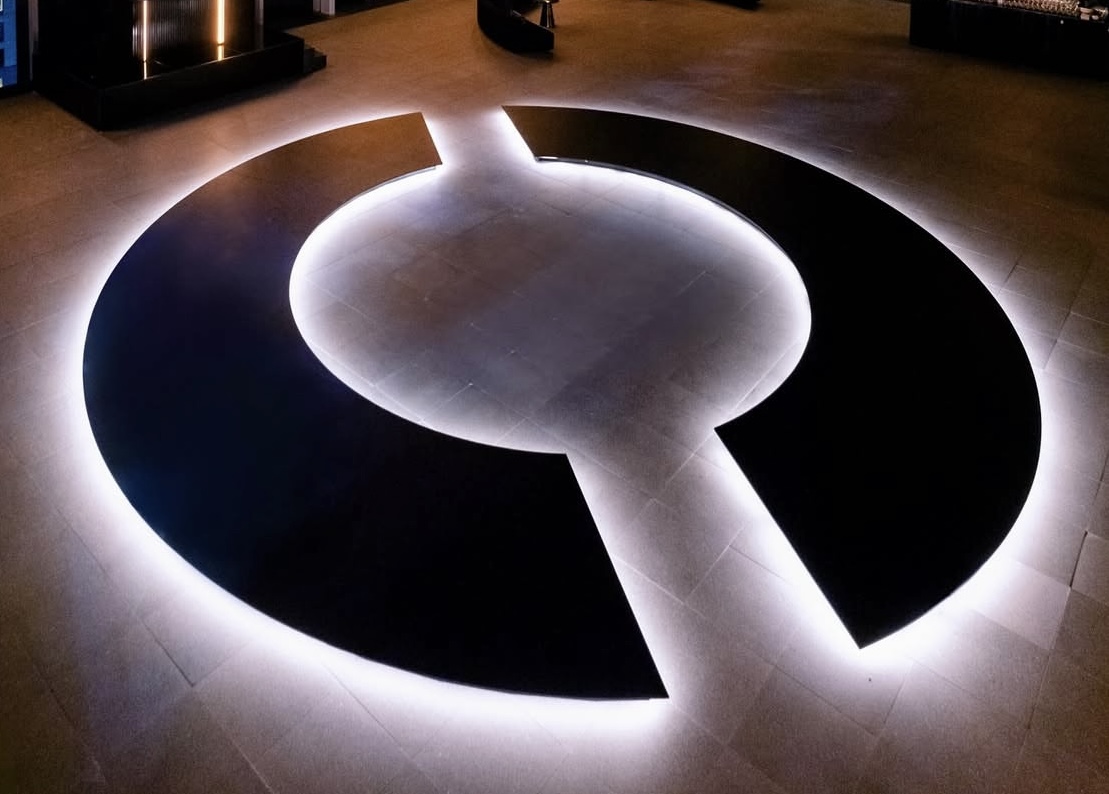 Customized Stages and Fabrication — Illuminated broken-circle stage with glowing perimeter — nightlife feature installation