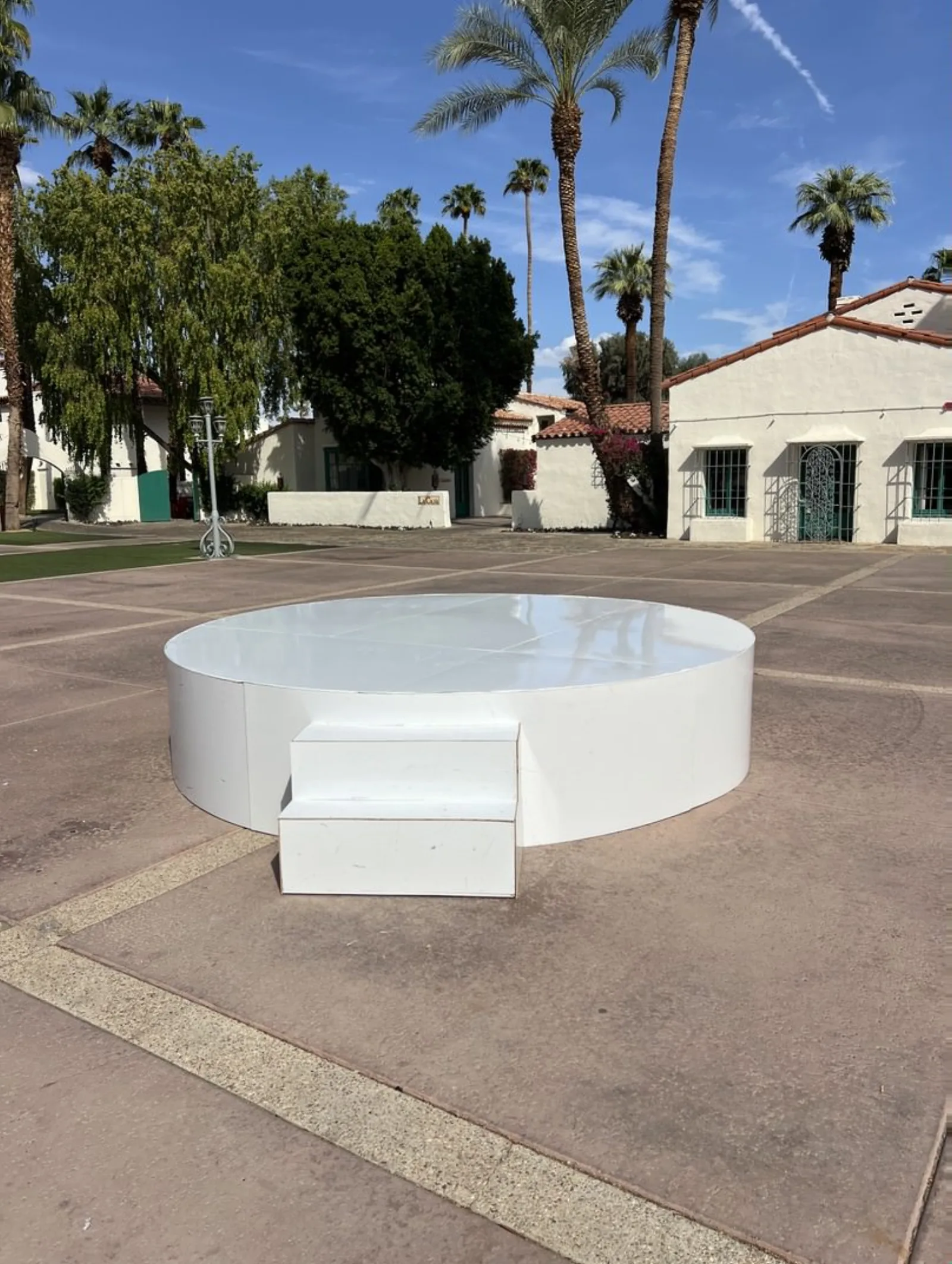 Circular and Round Stage Rental — Round white stage with stairs — outdoor plaza brand activation