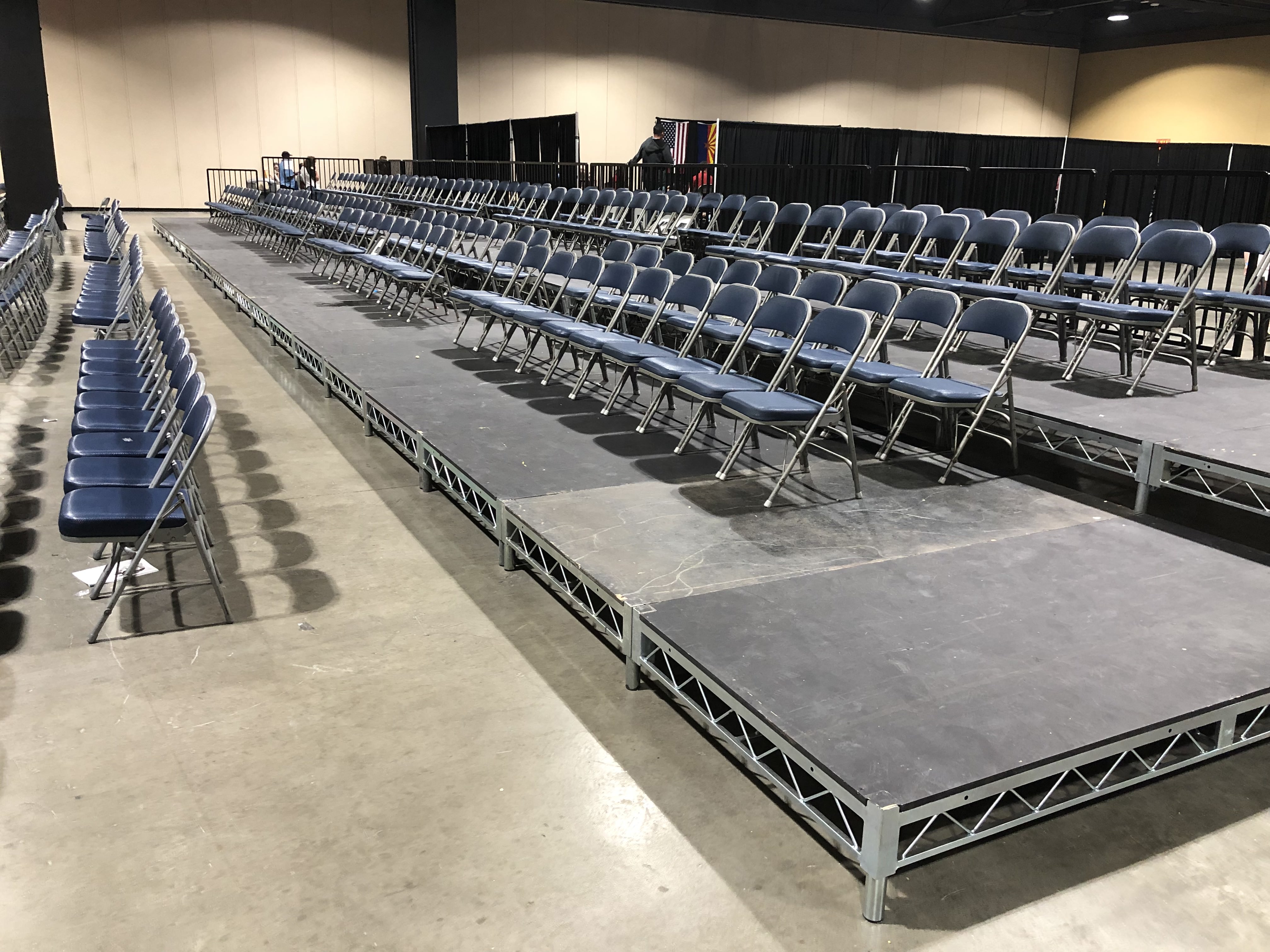 Bleacher and Riser Rental — Elevated bleacher platform with perimeter railings — outdoor guest seating build