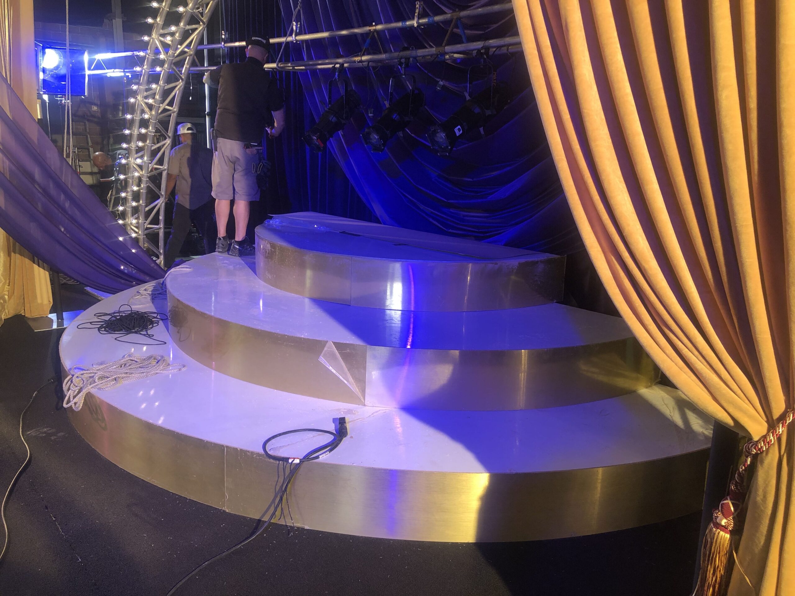 Custom LED lighted circular stage rental with truss and lighting setup by RCC Events